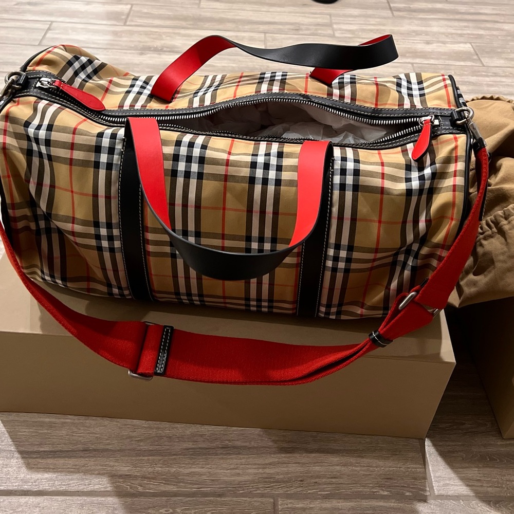 Burberry duffel bag.
